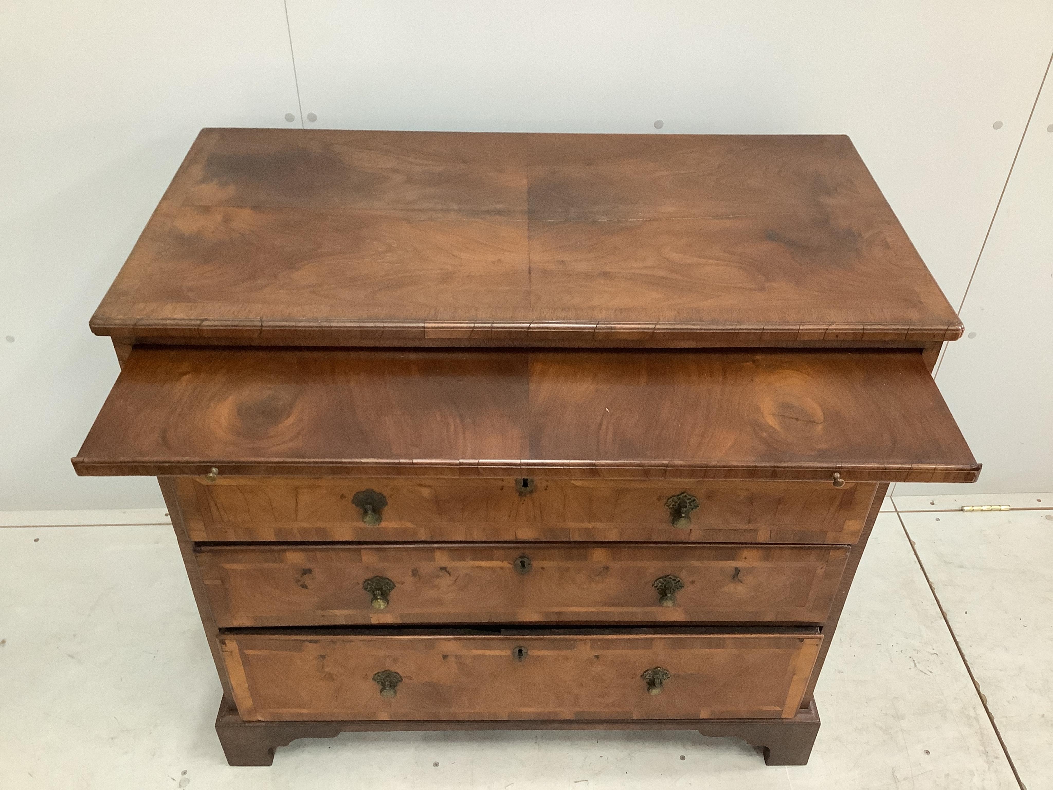 A George II walnut and isometric banded chest of drawers, width 99cm, depth 51cm, height 94cm. Condition - fair